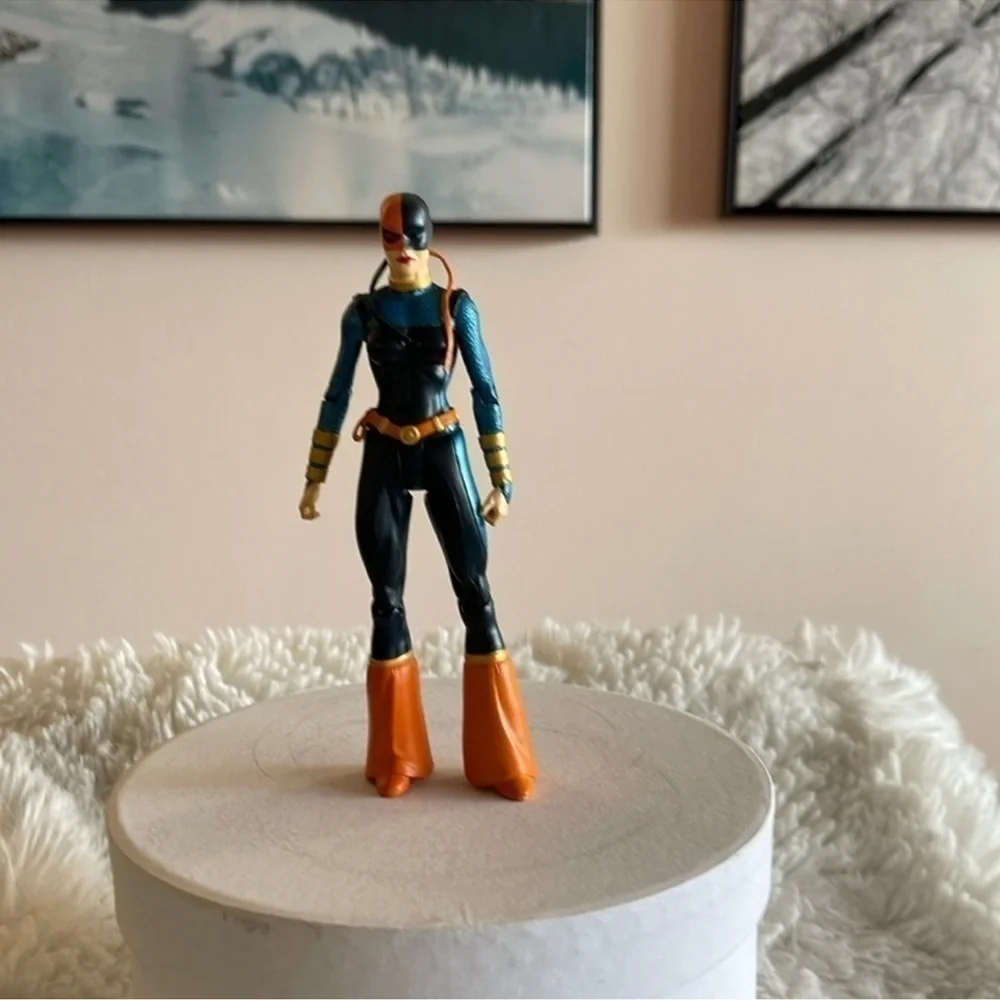 Action Figure with Orange and Blue Costume